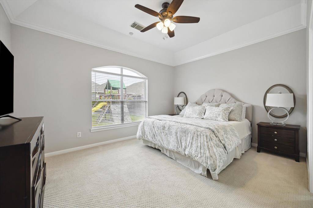 First-floor primary suite is a serene retreat with a spa-inspired bath (remodeled 2024) and generous walk-in closet