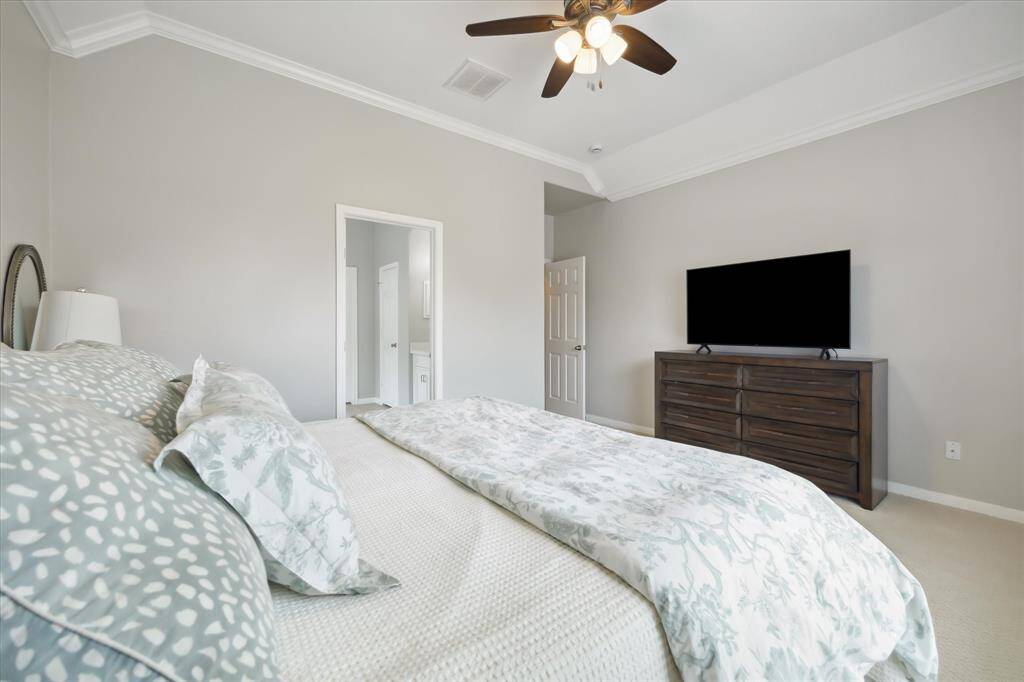 First-floor primary suite is a serene retreat with a spa-inspired bath (remodeled 2024) and generous walk-in closet