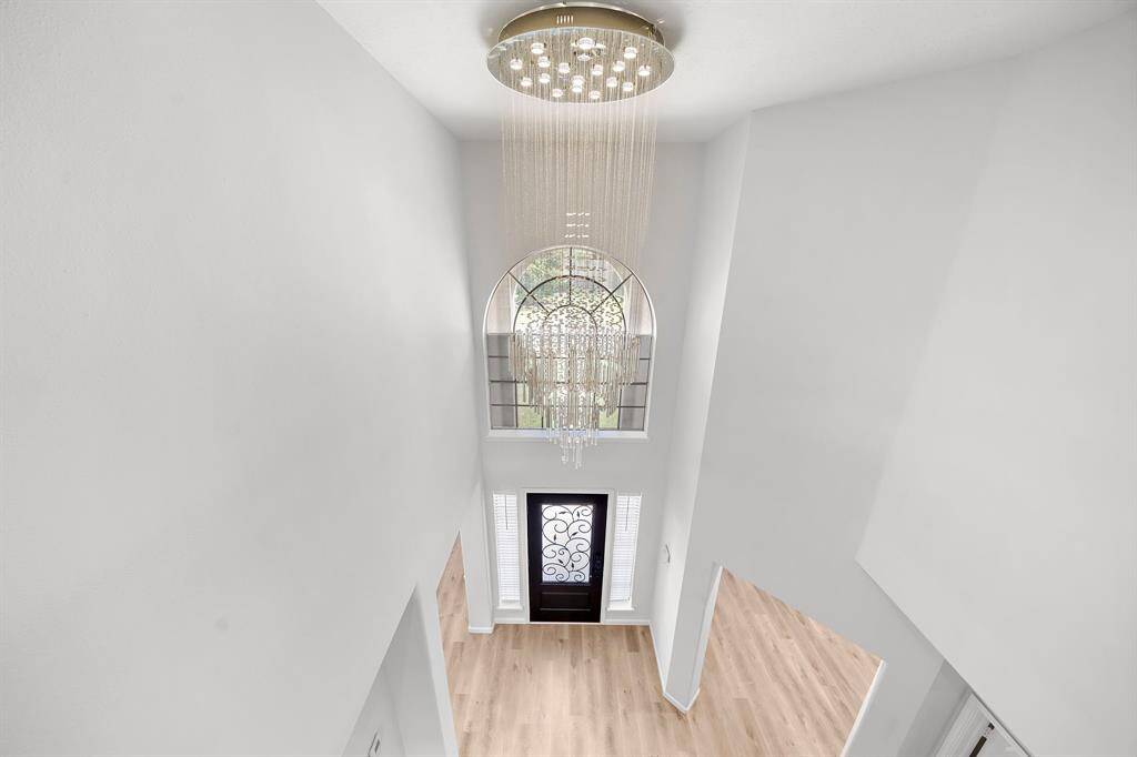 Chandelier in foyer from upstairs