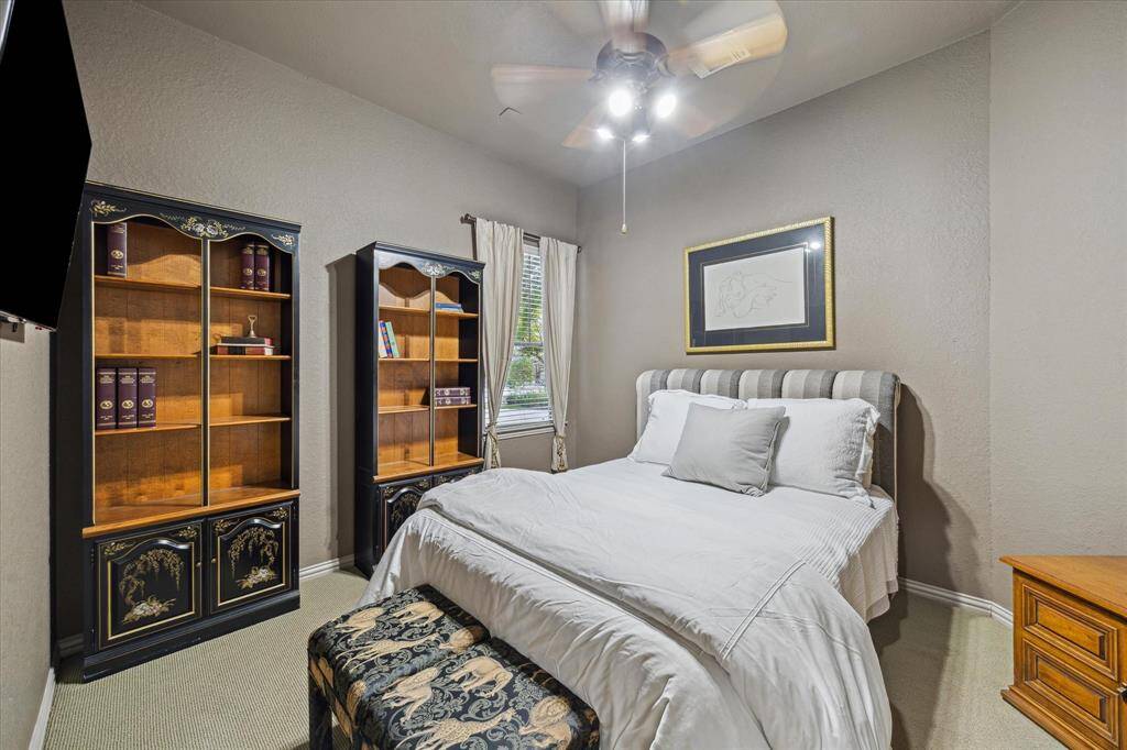 Secondary bedroom in back hallway, with walk-in closet
