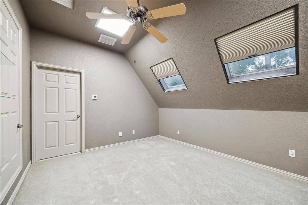 Bonus room, above 2-car garage with TV nook. Perfect for exercise or game room. Full attic access with abundance of storage.