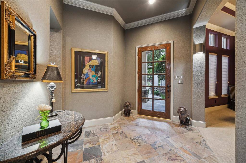 Entry way open to formal dining
