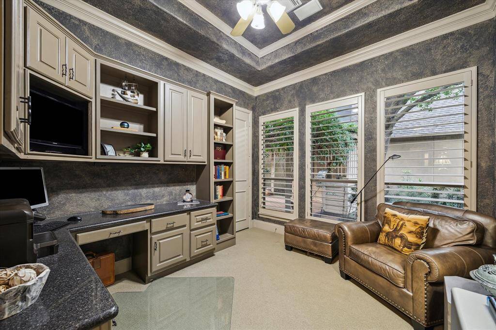 Study with built-in desk, cabinets, TV nook, closet with nice storage, off entry way.