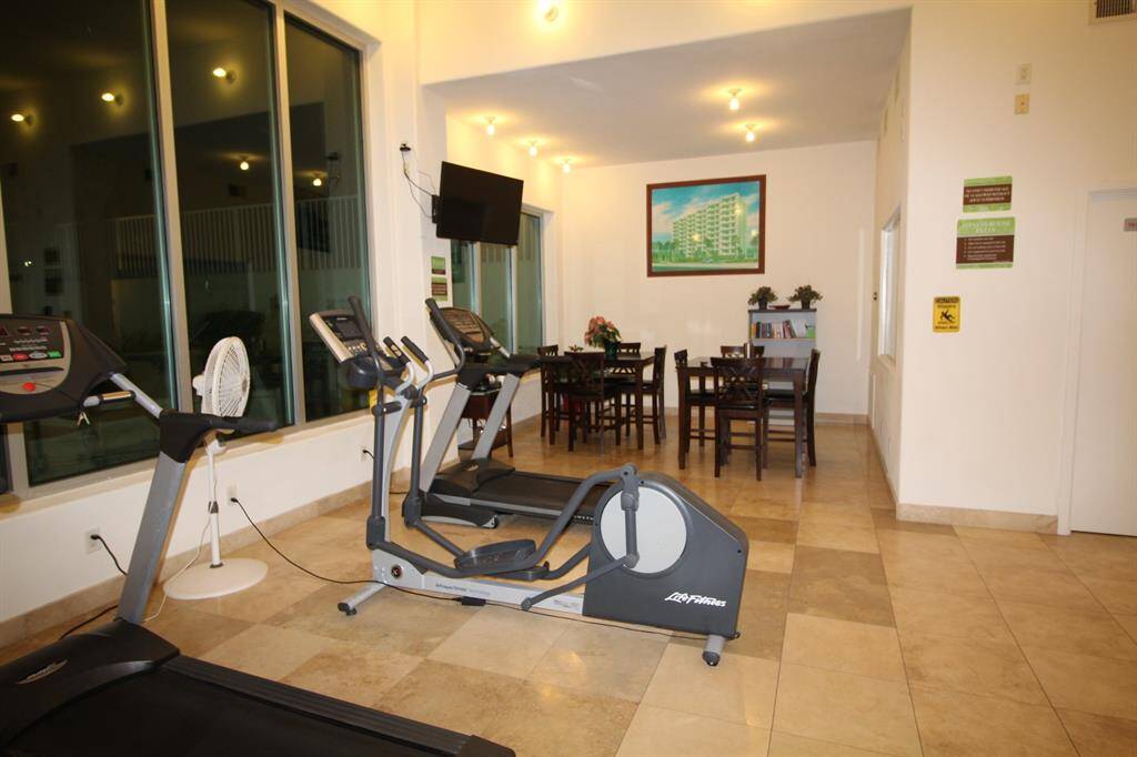 The fitness center has 2 treadmills, and elliptical, 2 stationary bikes and a weight machine. Plus an area for socializing. It also houses the on-site manager's office.