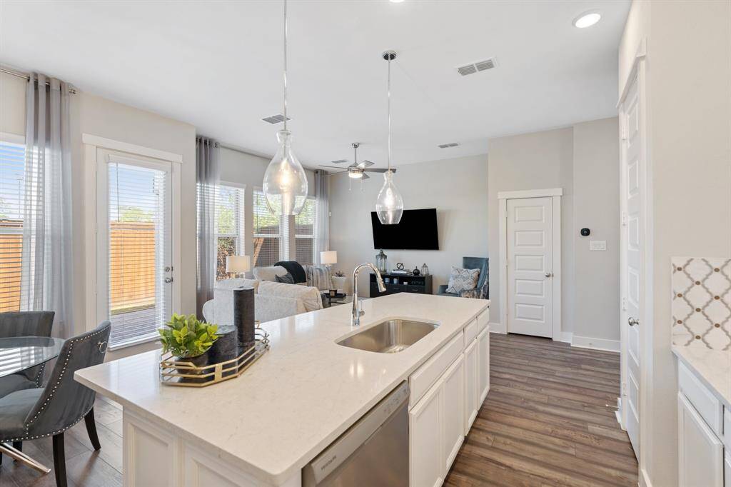 The cohesive design allows for effortless interaction between both spaces, making it perfect for everyday living and hosting guests.
