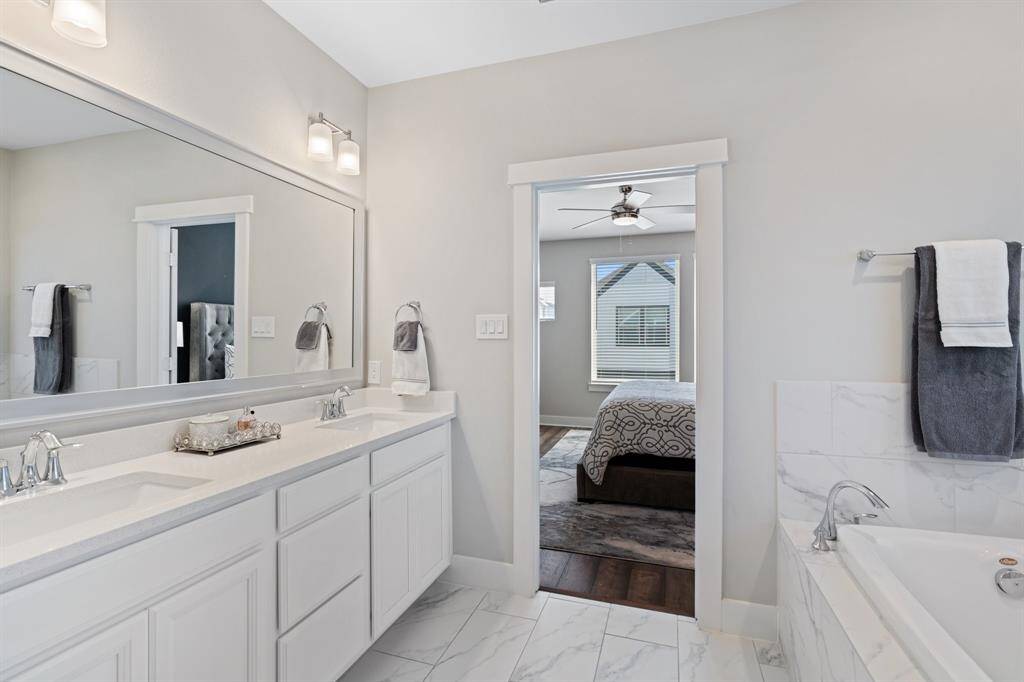 This serene space offers a perfect blend of relaxation and everyday practicality.