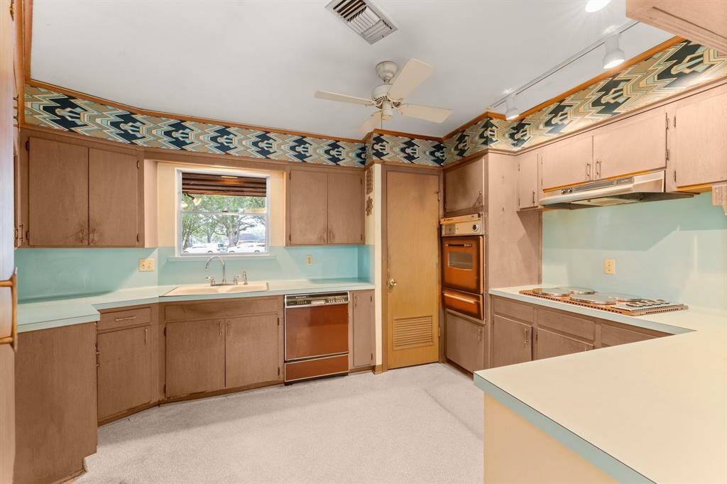 Kitchen views of front circle drive.  Original kitchen aid appliance package!