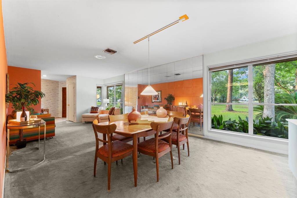 View of oversized side yard from dining.