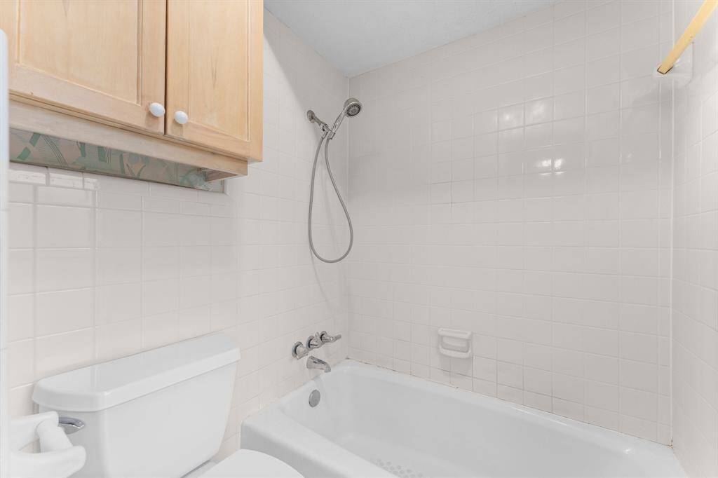 Private bath area separate from double sinks.