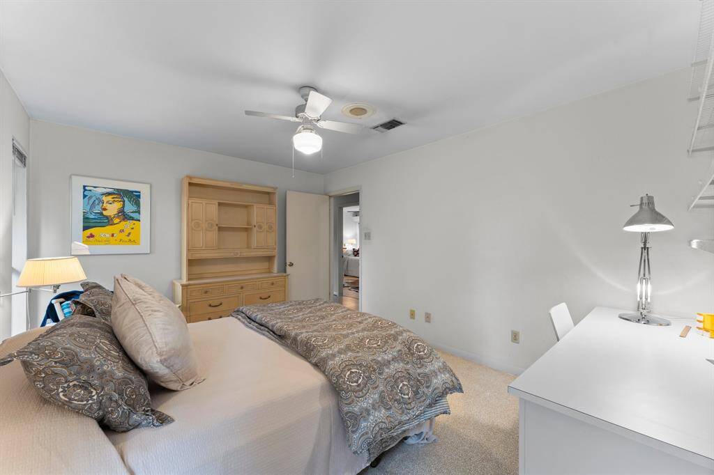 Bedroom 2: Largest of three extra bedrooms with walk in closet.