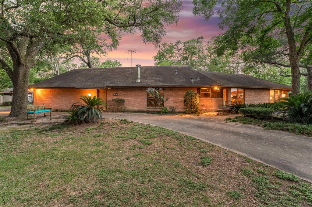Circle drive is perfect for social events, mature oaks and pines throughout.  Super cool pass through from circle drive to carport.