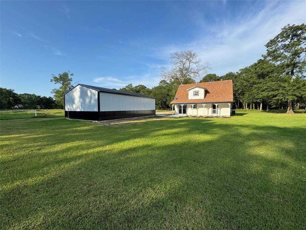Whether you're looking to relax under the covered back porch and enjoy the naturistic view or looking for a place to create your own perfect backyard oasis, this spacious backyard provides an amazing canvas for creativity!