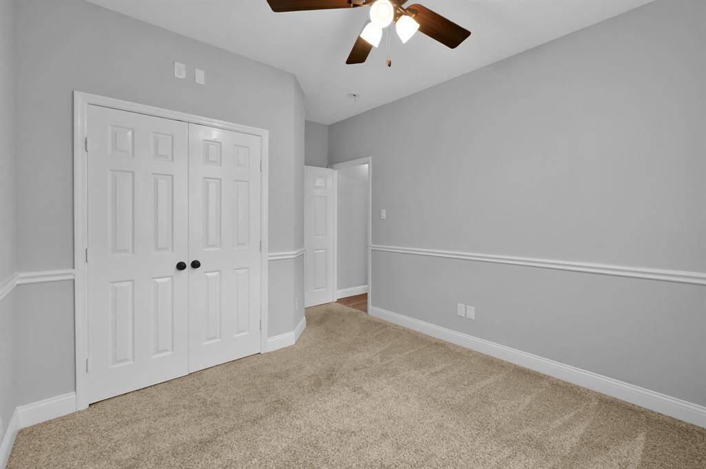 Another angle of Bedroom #3. Both secondary bedrooms feature spacious closets.