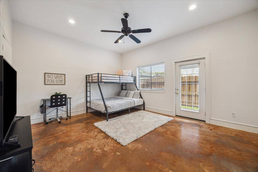 1st floor bedroom with access to the back green space.