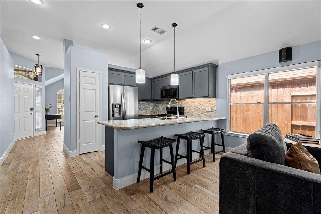 entry to dining leads into your open kitchen/living room areas