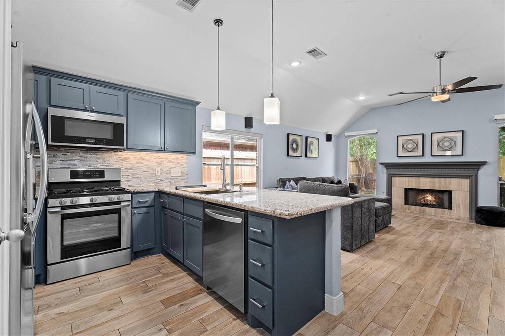 gorgeous kitchen with contemporary color palette & LG Appliances