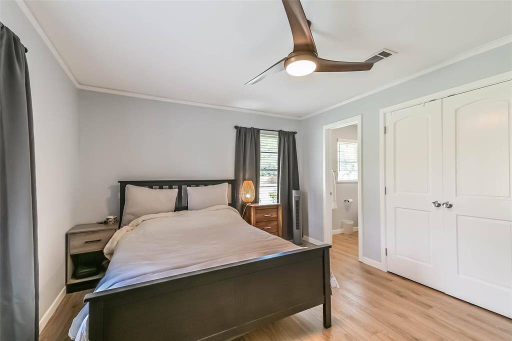 View across the Primary bedroom showing the double doors to the closet and Ensuite bathroom