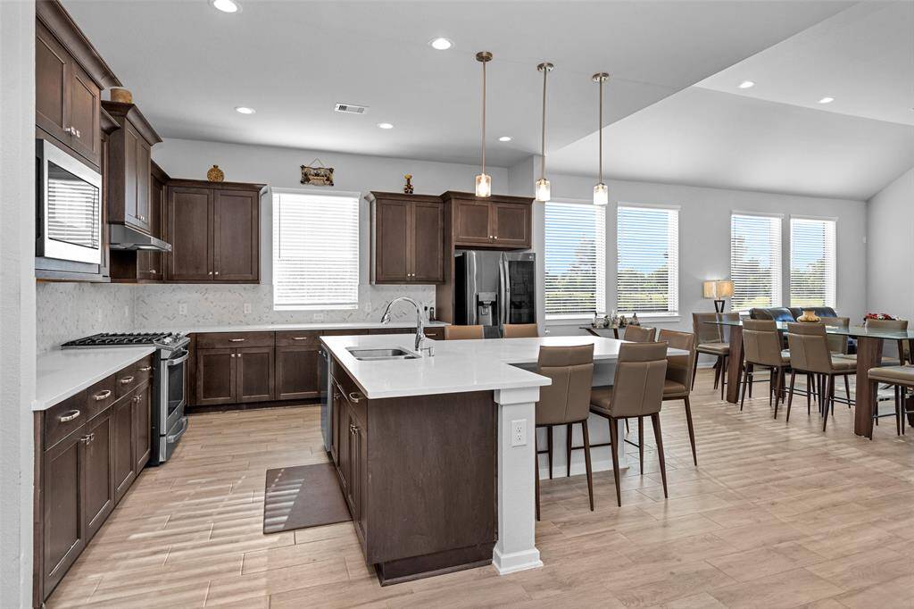 The kitchen is open to the living and dining. So much counter and cabinet space.