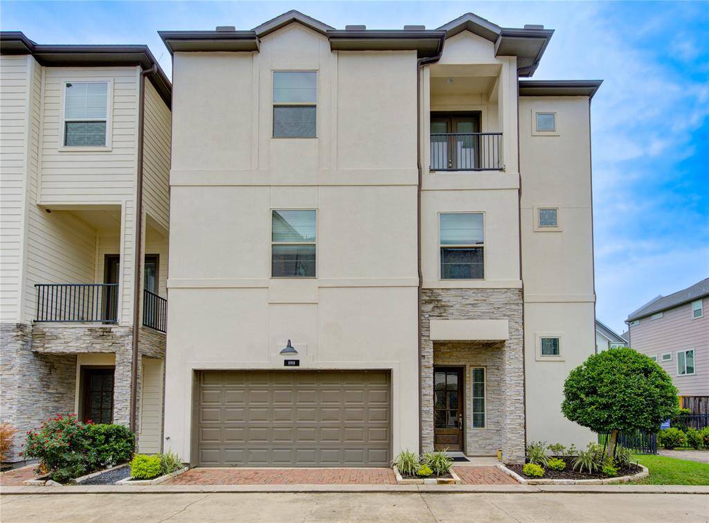 Welcome home to 10918 Brookshire Chase in the sought after Spring Branch! Modern stucco exterior with clean architectural lines accented by natural stone detailing creates a sleek, upscale presence. Located on a premium corner lot, this home stands out with extra green space, additional guest parking, and enhanced privacy with no neighbor on one side. A true showstopper in a gated community setting.
