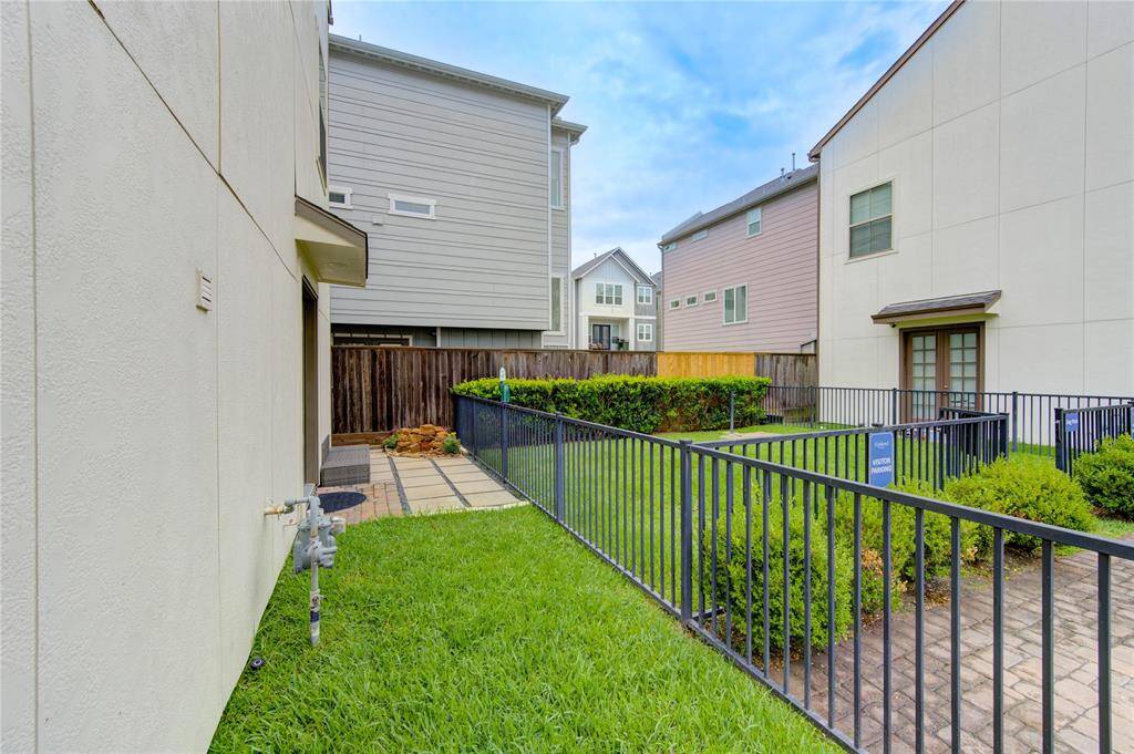 Rare and private side yard offering lush green space ideal for outdoor entertaining, gardening, or a pet play area. Located on a desirable corner lot with no neighbor on one side, this outdoor area is an extension of the home’s living space and provides added privacy and natural light. Fully fenced and beautifully maintained—perfect for enjoying fresh air in your own secluded retreat.