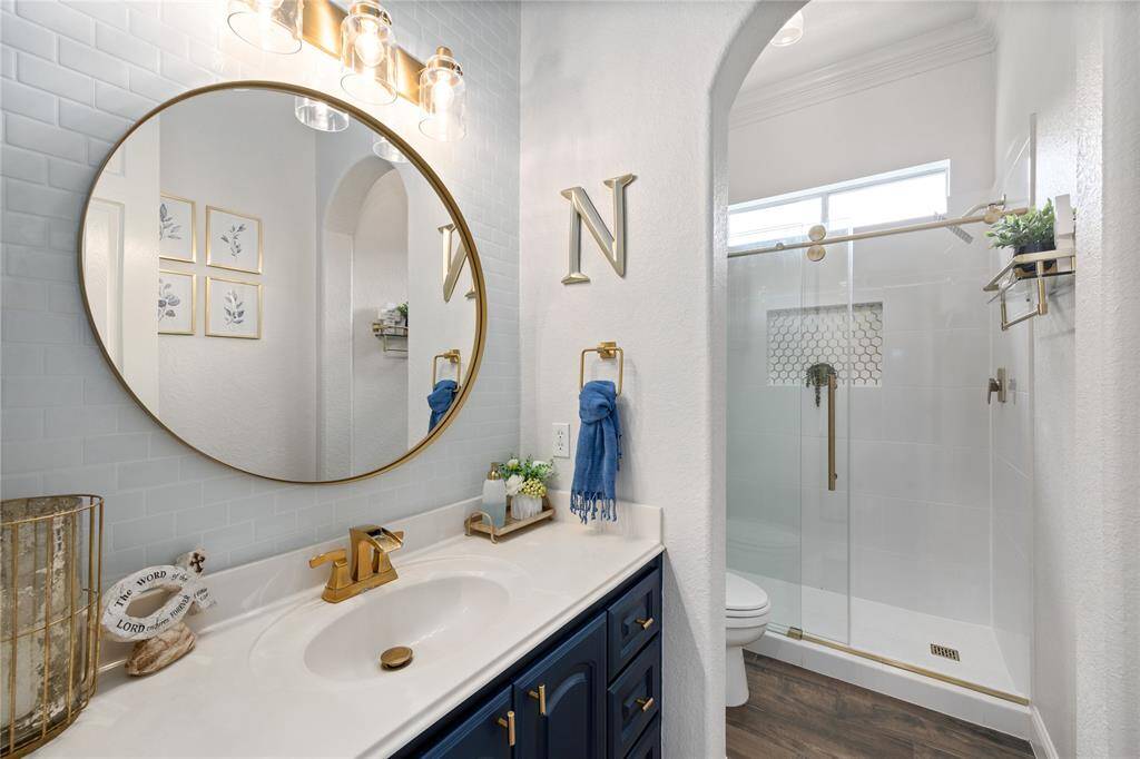 Full Secondary Bathroom is just outside the home office/possible bedroom.
