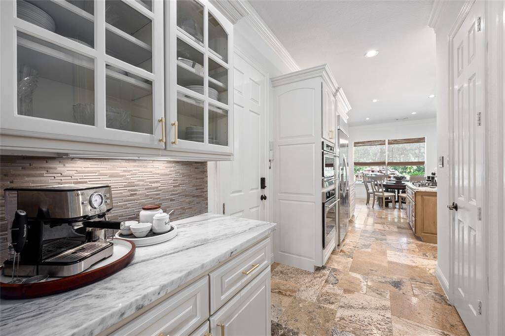 Butlers Pantry area offers even more storage and the perfect coffee station!
