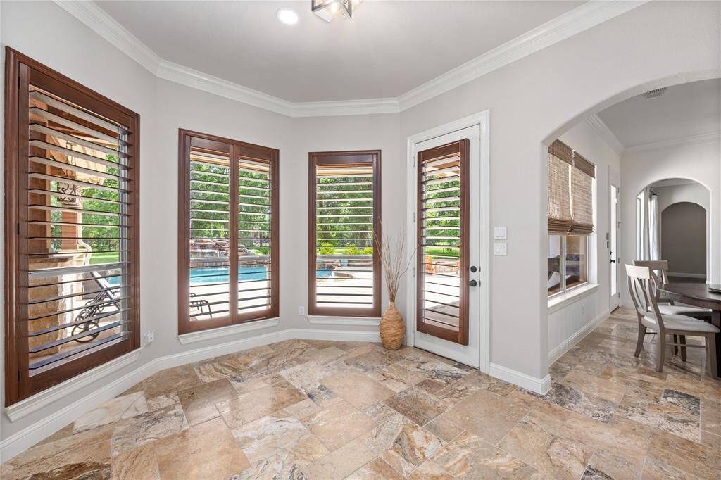Just off the Breakfast area is this Flex room! Could be used as a wine lounge, converted to another home office, play room so the little ones are right around the corner while cooking dinner, or maybe even a work out room...possibilities are (almost) endless!