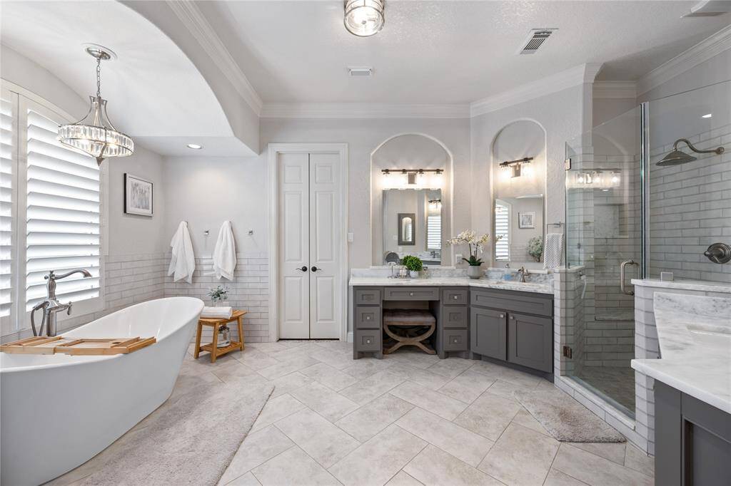 LUXURY and BLISS greets you every day in this beautifully updated primary bathroom! Fully remodelled primary bathroom was meticulously designed with elegance and functionality in mind!