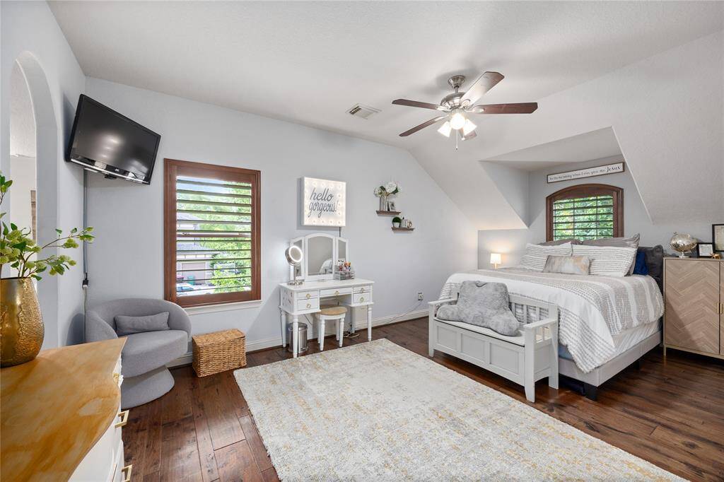 Secondary bedroom #2 has a unique layout with a large walk in closet