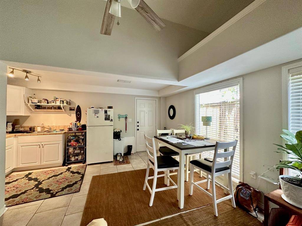 Another perspective of the dining and kitchen area