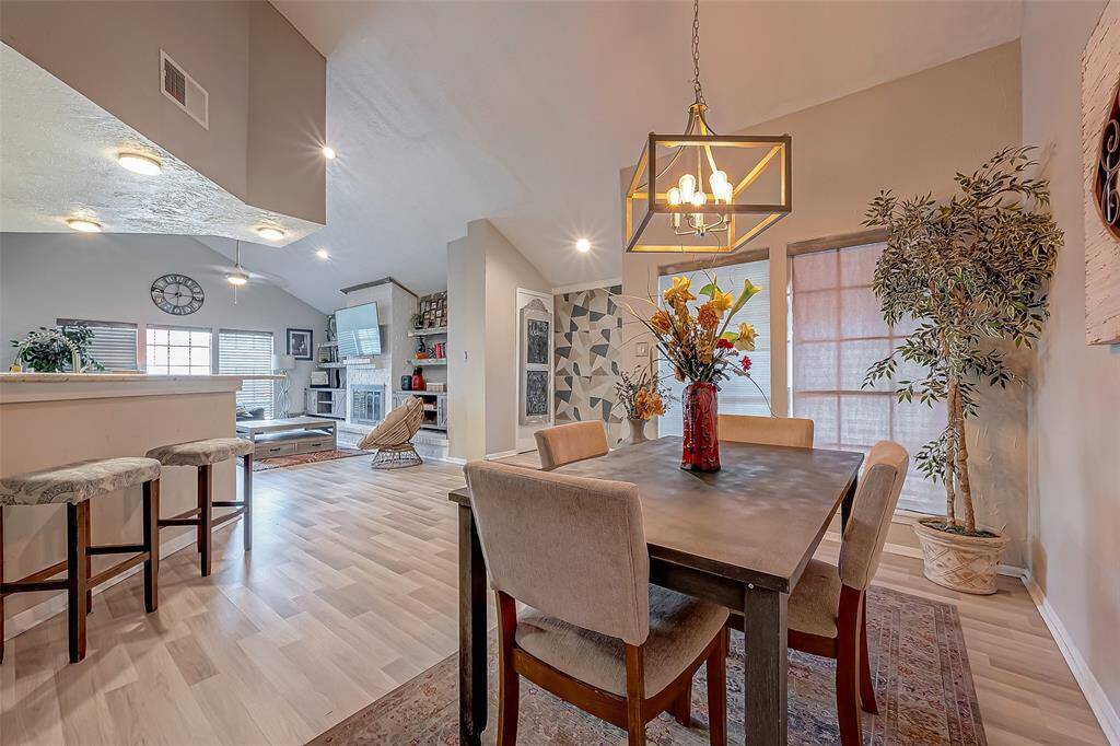 Dining area with elegant lighting.