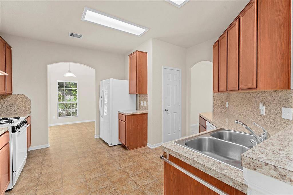 Kitchen looking into Breakfast Room