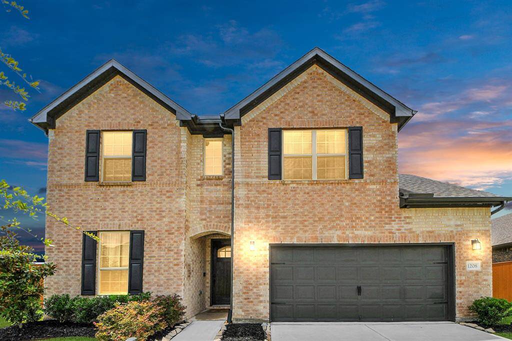 Welcome to 1208 Seaside Cove Ln where your own Spacious backyard oasis with a sparkling pool, spa, covered patio, and lush green lawn awaits you.