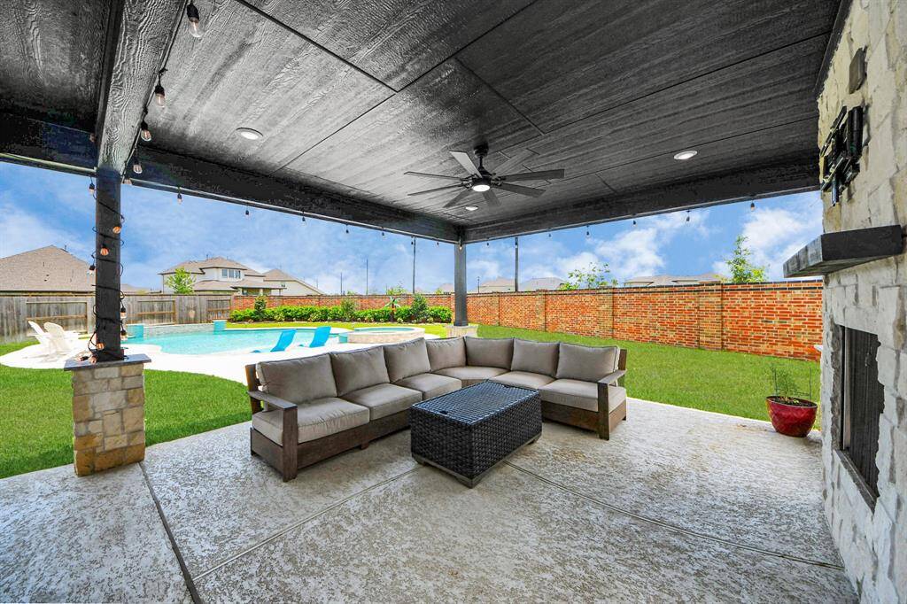 Inviting outdoor hot tub offers resort style living right at home.