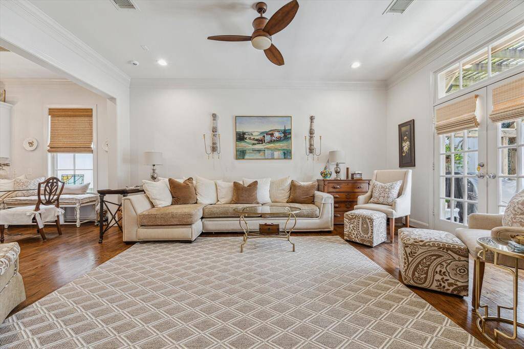 Comfortable family room with easy access to the kitchen and french doors that invite you outdoors.