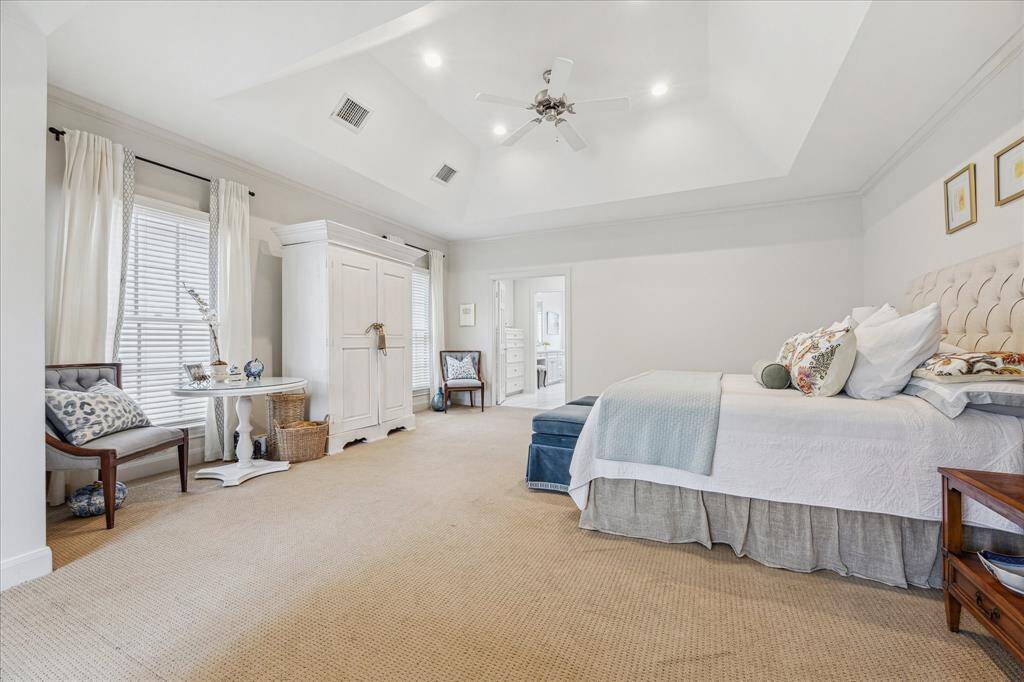 Relax in this generously-sized and serene primary suite on the 2nd floor.