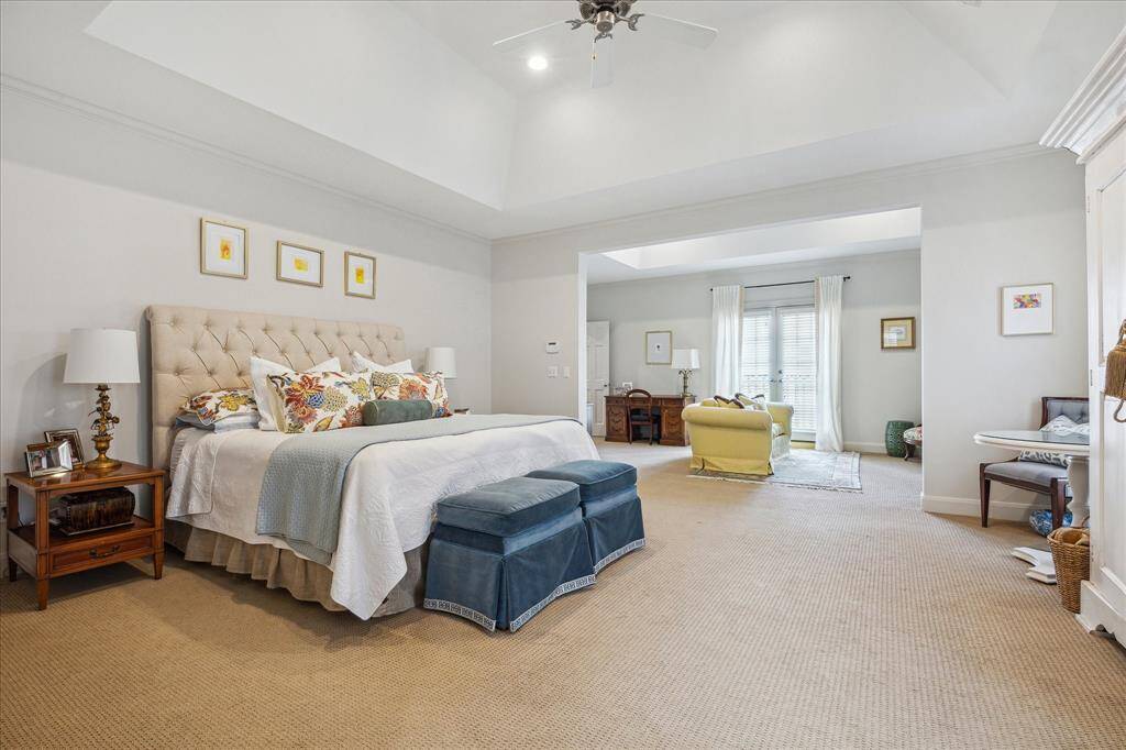 Looking from the bedroom towards the sitting room in the primary suite.