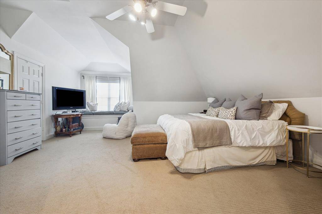 Fourth bedroom or game room on 3rd floor with full bath and elevator access.