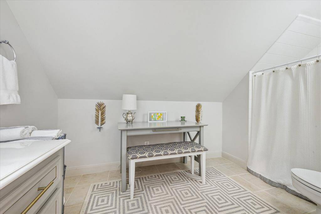 Updated full bath with shower and tub on 3rd floor.