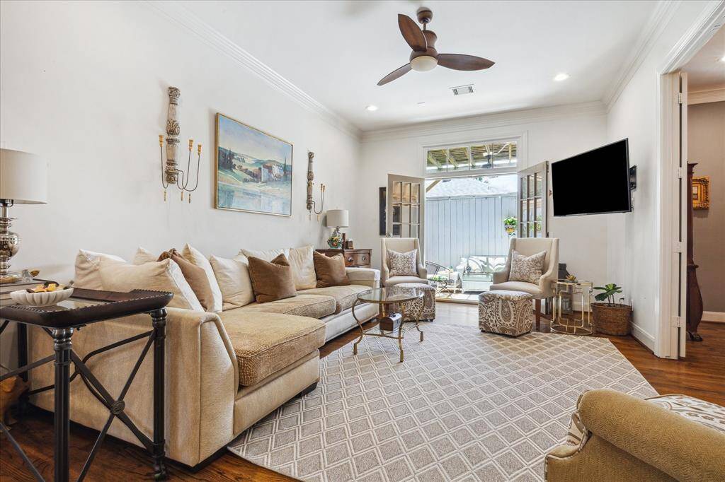 Family room has french doors that open to flagstone patio.