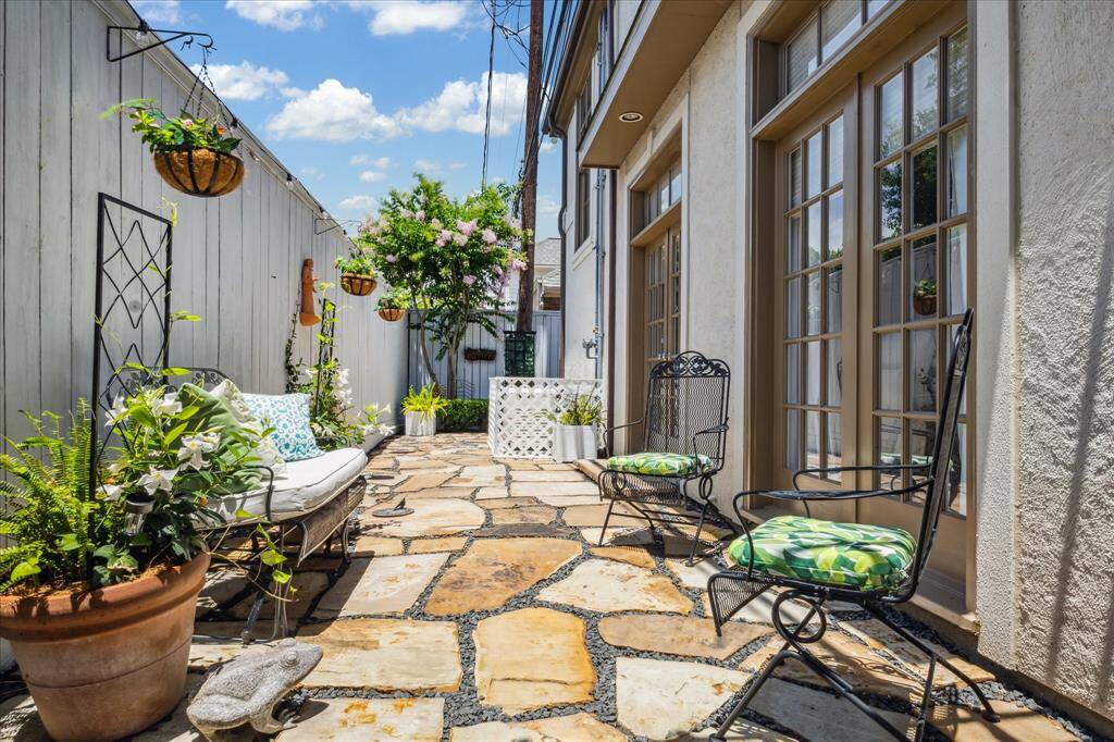 Back patio runs the length of the home.