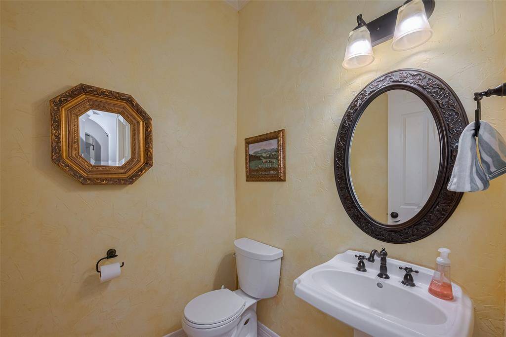 Some updates you might easily miss include elegant wall treatments like Venetian plaster and custom faux paint finishes in the guest bath. All 4.5 bathrooms have also been upgraded with modern "tall" toilets for added comfort.