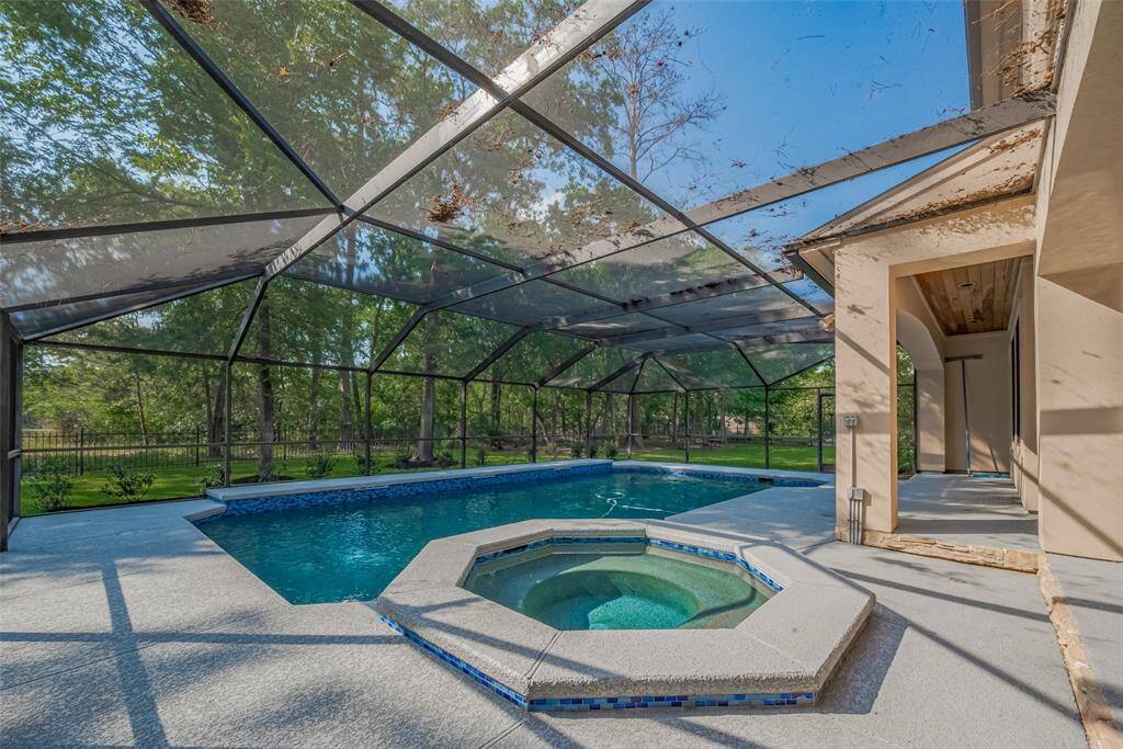 Custom-built by Pine Oak Builders, this home was thoughtfully designed to maximize its prime location along the 9th hole fairway, while enjoying added privacy from a line of mature trees. For extra peace of mind, all windows facing the golf course are shatterproof and were installed in 2017 (per Seller).
