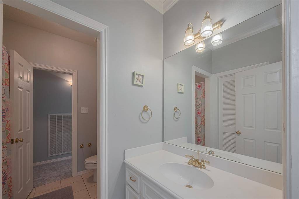 The fourth full bath is conveniently located off Bedroom #4 and adjacent to the Media Room, which can also serve as a fifth bedroom.