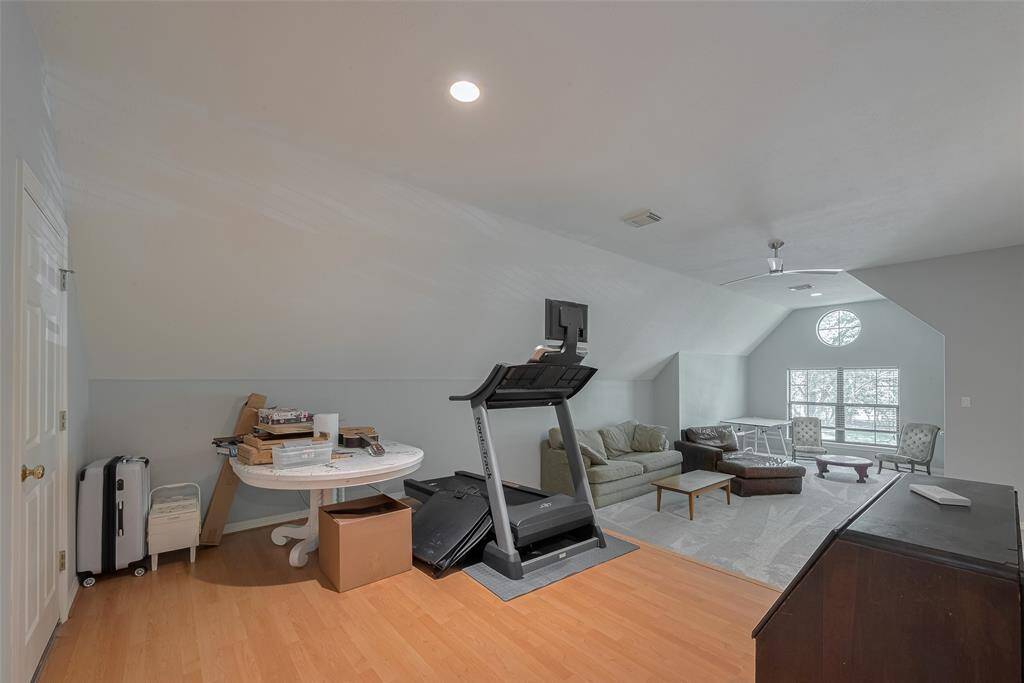 The expansive media room—potentially serving as a fifth bedroom—is a private retreat upstairs, complete with a full closet and windows. At approximately 33' x 18', the space offers endless possibilities limited only by your imagination!