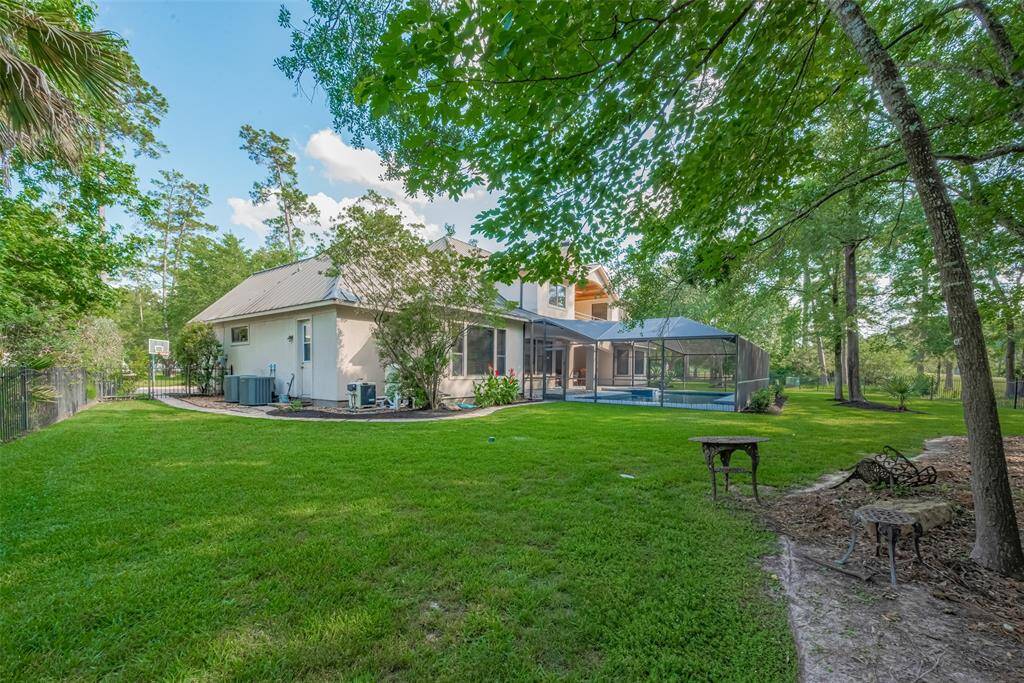 ust under half an acre, this property offers peaceful privacy overlooking the golf course. Not shown are the home's three AC units, all upgraded to Trane systems in 2018, along with three hot water heaters updated in 2020.