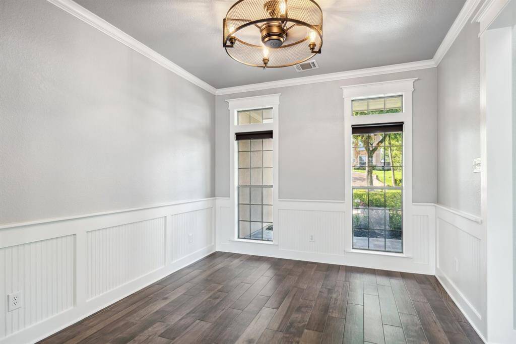 Formal dining room with lots of natural light