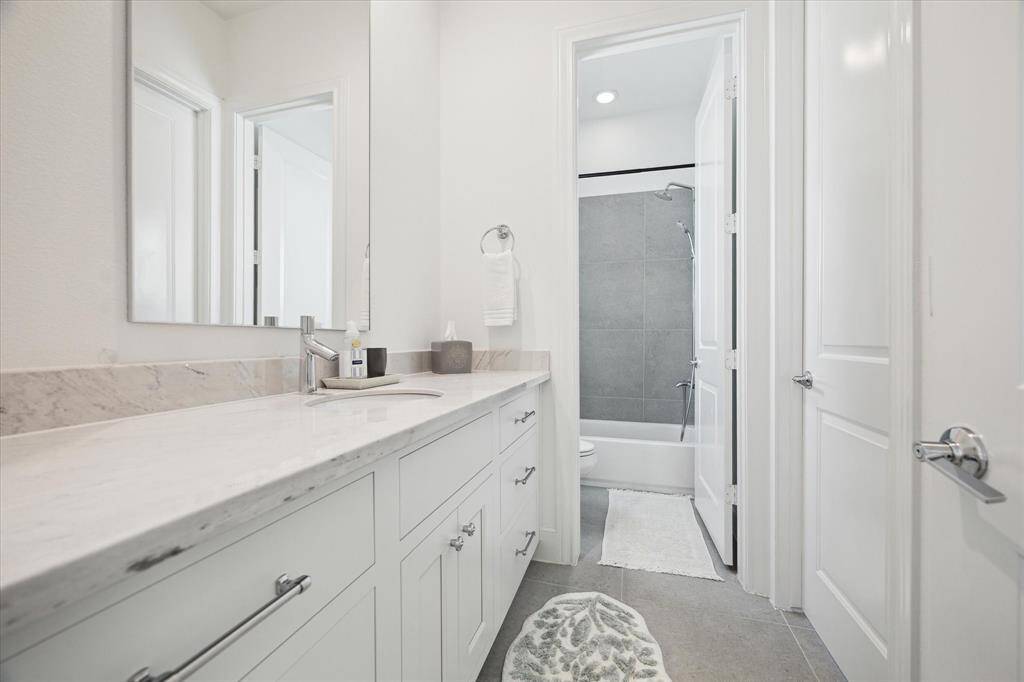 Bedroom #2 shares an adjoining bath with Bedroom #3.