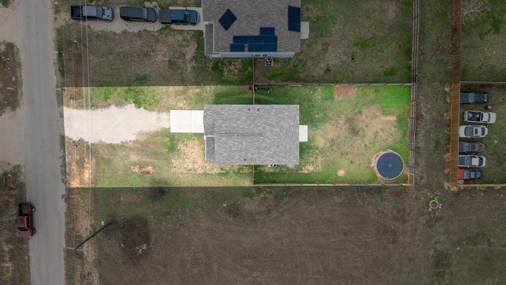 This home sits on a large lot with ample yard space in front and the back.  Plenty of space to accommodate guest parking and situated on a quiet street Hempstead with no restrictions.