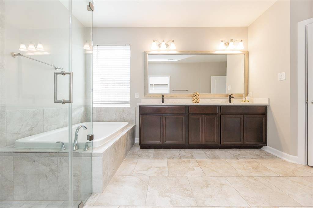 Primary suite walk-in closet.